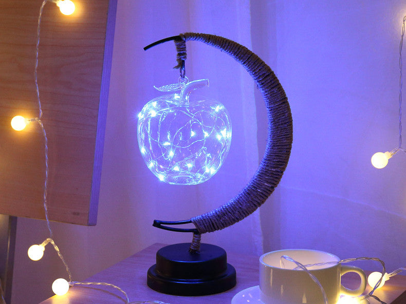 Moon-shaped night light