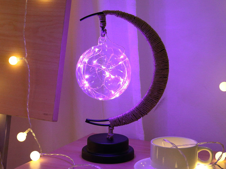 Moon-shaped night light