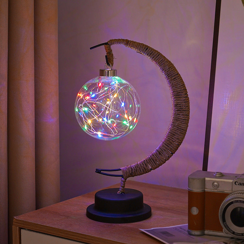 Moon-shaped night light