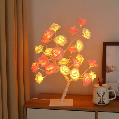 Christmas Decorative Night Light illuminating a charming rose lamp on a wooden table with a cozy atmosphere.